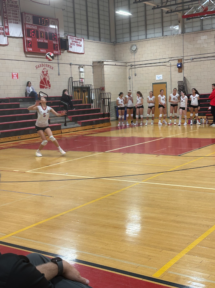 Junior Caitlin Truong serving the ball in the third set for Hingham.
Kaitlyn Manning