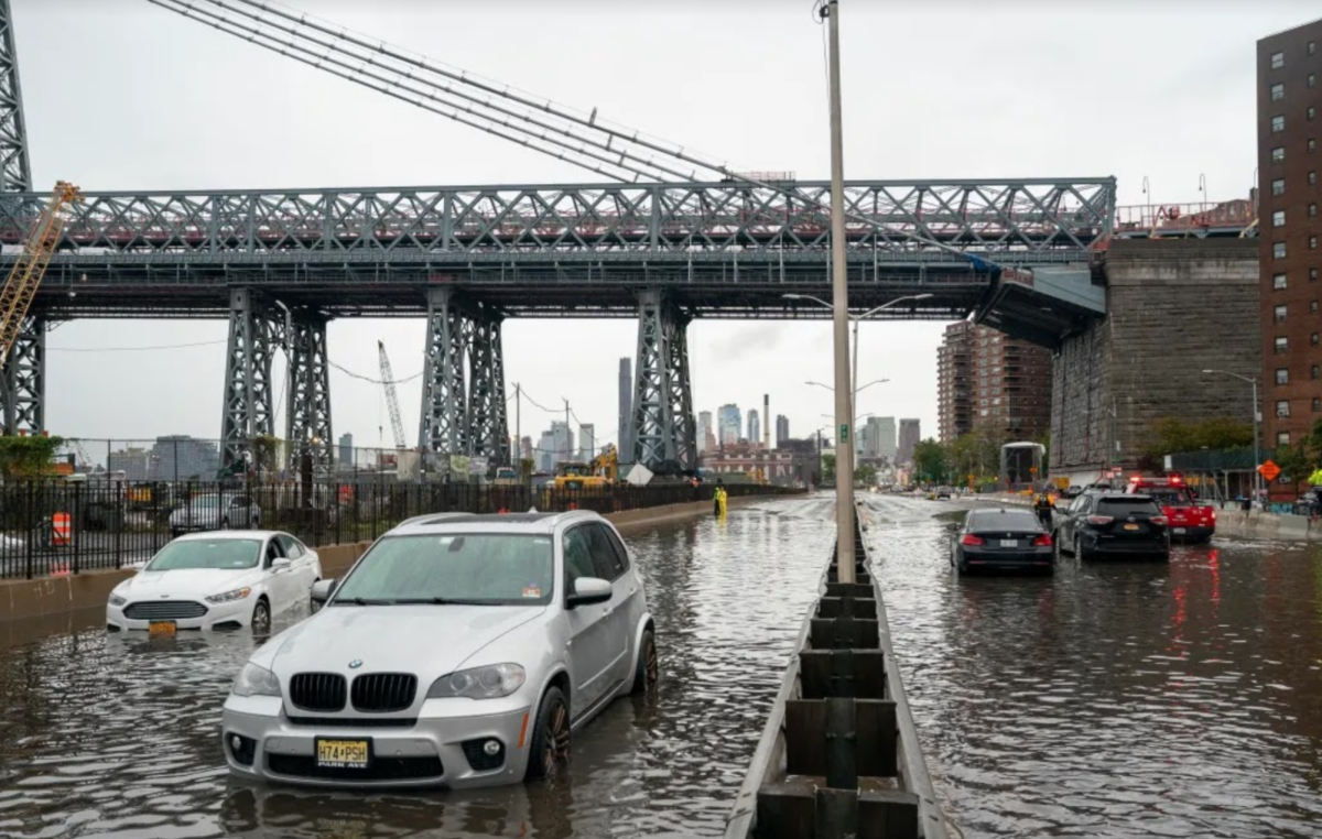 Cars sit in flood water from extreme rainfall in Manhattan, New York.
Photo taken by Barry Williams of the New York Daily News.