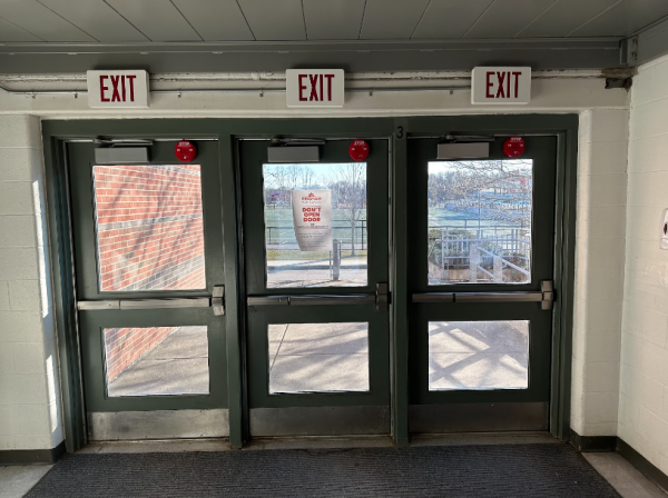 A set of alarms at the three-door-exit to the fields, in the 120s hallway. By Will Sartor