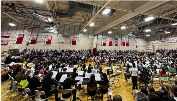 Nearly Four Hundred Band Students in Grades 5-12 took us “Back to the 80’s” for this year’s All-Town Band Concert. Photo Credit: HMPA
