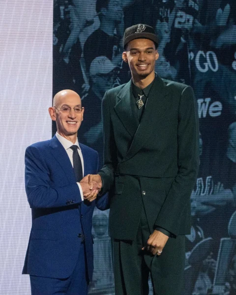Victor Wembanyama on stage after being selected first overall in the 2023 NBA draft