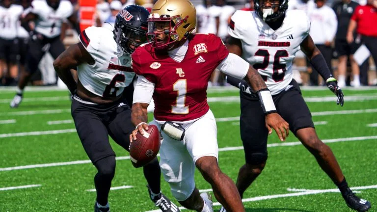 Boston College quarterback Tommy Castellanos evading a sack