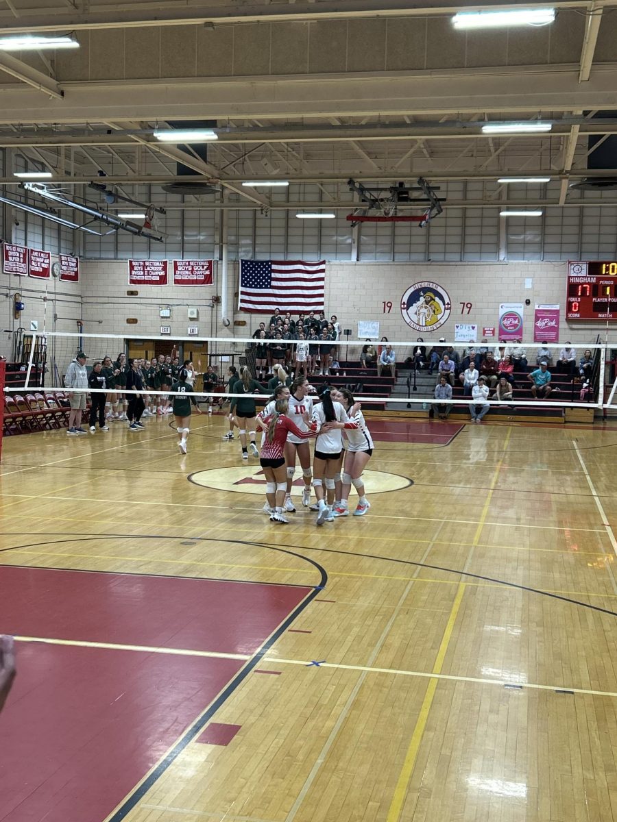 Hingham High School's Girls Varsity Volleyball team at their "Dig Turquoise" event at the HHS gym. 
