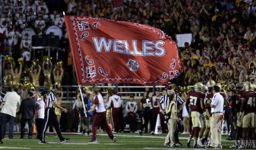 Photo of fans honoring Welles Crowther during the first half of the Boston College game.