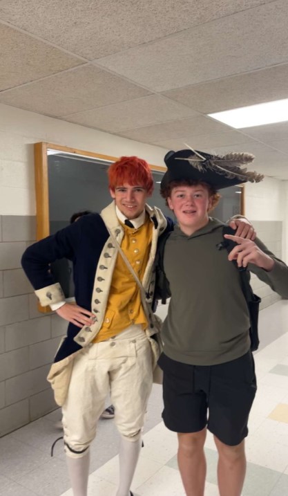 Image taken by Jack Griffiths, image depicts students William Pollenz and Boris Goldin Correa showing pride on red white and blue day.
