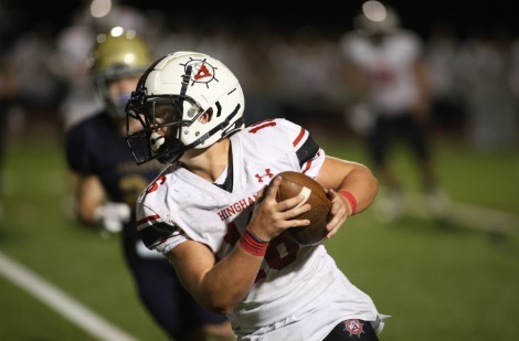 Swiss Army Knife Running Back Chase Beighley catching a pass and turning up field Credit: Joshua Ross Photography
