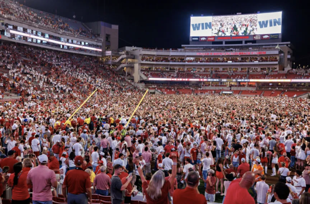 Arkansas fans stormed the field after upsetting #4 Tennessee.