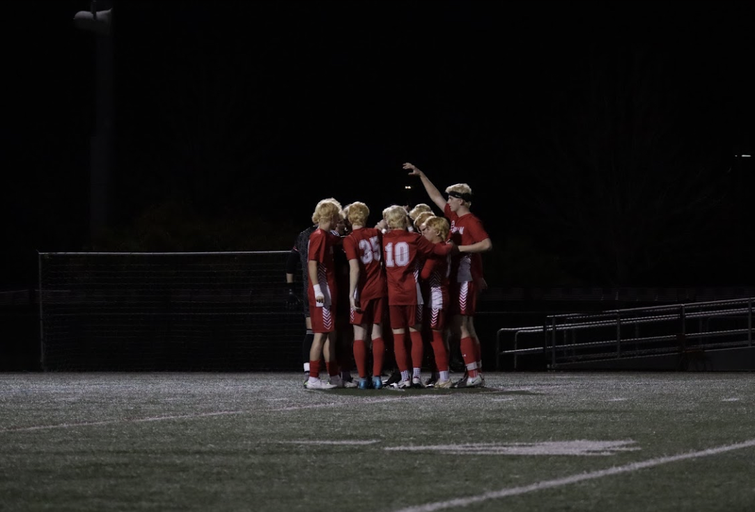 The Hingham Boys gathered in their pregame huddle before the kickoff against Nashoba.