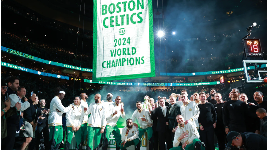 The Boston Celtics celebrate their 18th championship and hang the banner prior to the opening game against the Knicks.