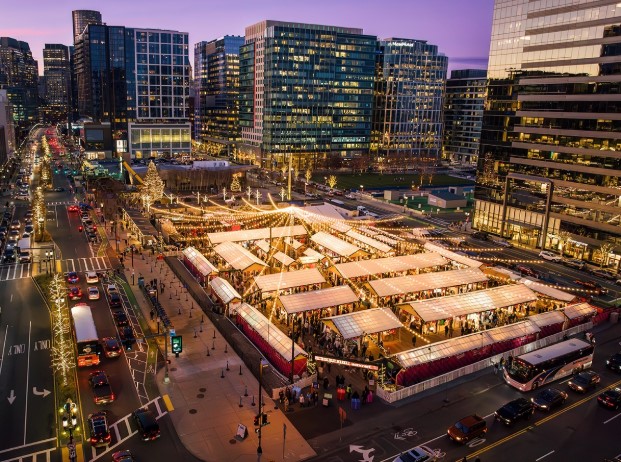 (The Holiday Market in the Boston Seaport lit up at night) Photo by Alex Pickering
