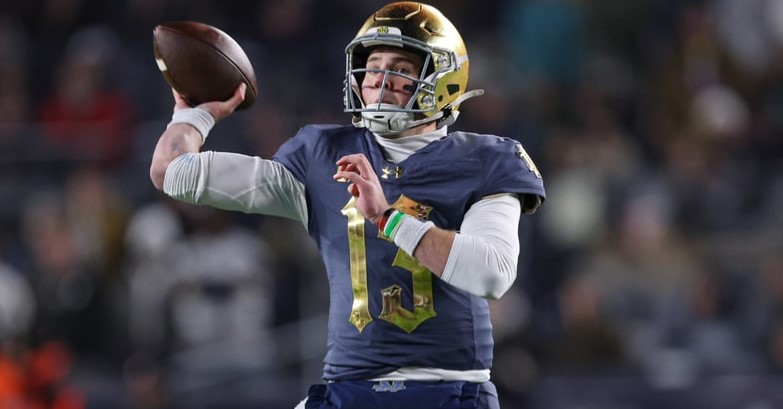 Riley Leonard, the quarterback of Notre Dame looks to send a ball downfield. (Vincent Carchietta)
