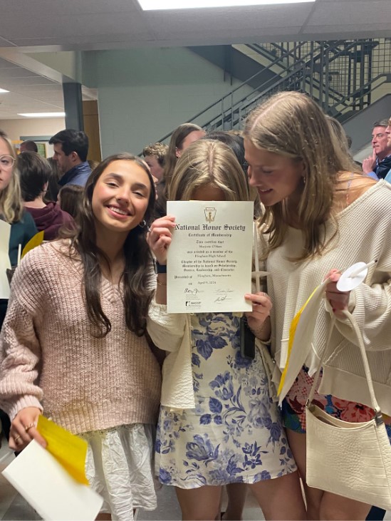 (Current Seniors Ellie Fortuin (left), Caroline O’Hara (center), and Maddie Cusack (right) at their NHS induction ceremony last year, taken by Jennifer O’Hara)