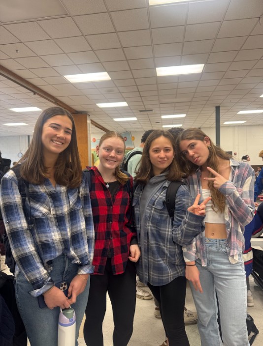 Juniors, Ella O'Neil, Emily Kiernan, Libby Rodgers, and Tessa Grossman participating in Flannel Day! Photo Credits: Katie Whitlock 