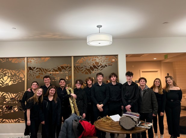 (Above) The HHS Jazz Band is all smiles at Penniman Hill Retirement Center (Photo credit: Parker Bradl).
