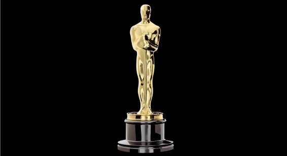 The Oscars statuette holding a sword and standing on a roll of film that is awarded to winners of the Academy Awards.