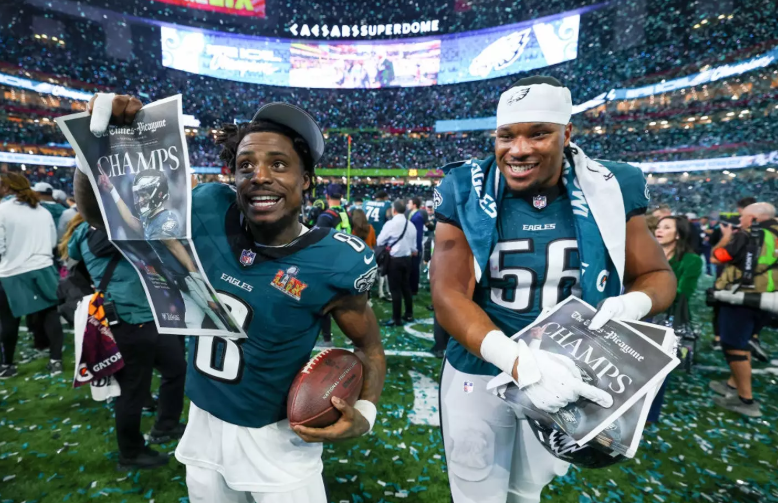 CJ Gardner Johnson (#8) and Jalyx Hunt (#58) celebrate together after their Super Bowl triumph.
