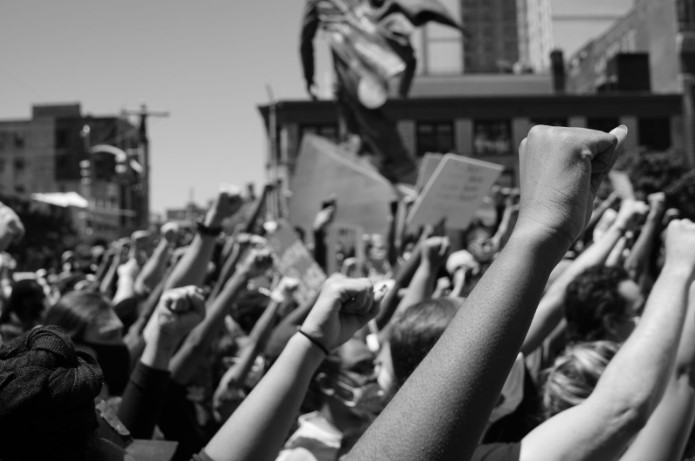 Kevin Claiborne encaptures the moment when protestors advocate for their rights inside of America. 
