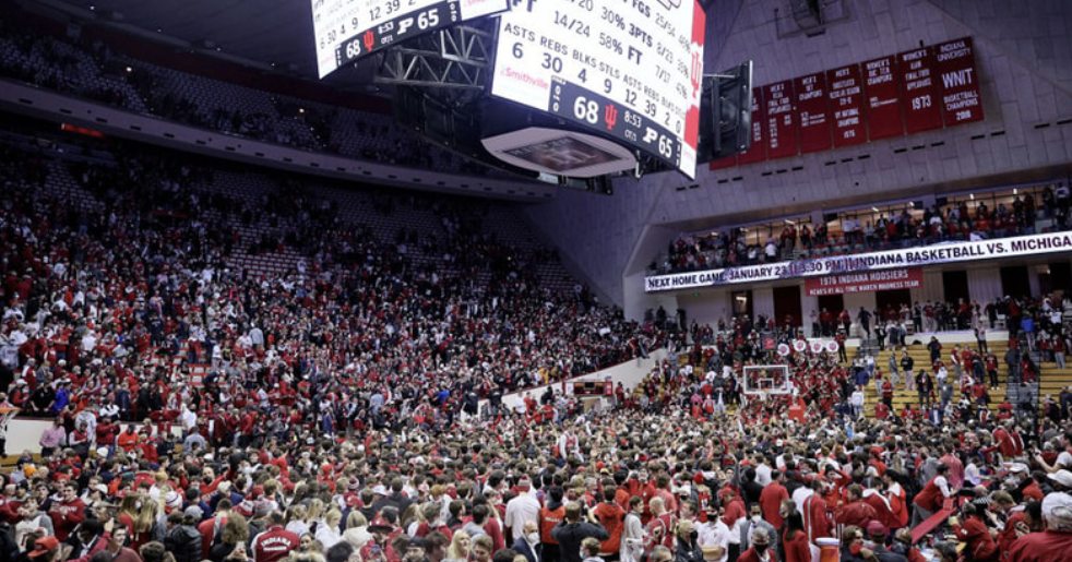 Indiana Basketball fans storm their court after beating Purdue this past year.