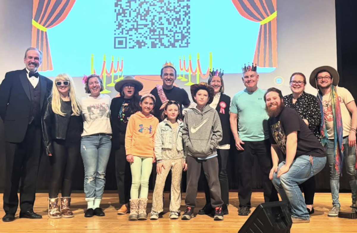 The talented teachers that participated in the competition gather for a group photo after Mr. Cincotta was announced the winner. From left to right, Mr. Porter, Ms. Petrie, Ms. Jope, Ms. Papuga, “Ms. Jope’s helpers,” Mr. Cincotta, Ms. Black, Mr. Burke, Mr. Conley, Ms. Roth, and Mr. Bagan.