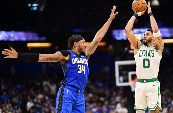 Jason Tatum shoots over an Orlando Magic defender in game 4 of the series. Credit: Justin Quin.