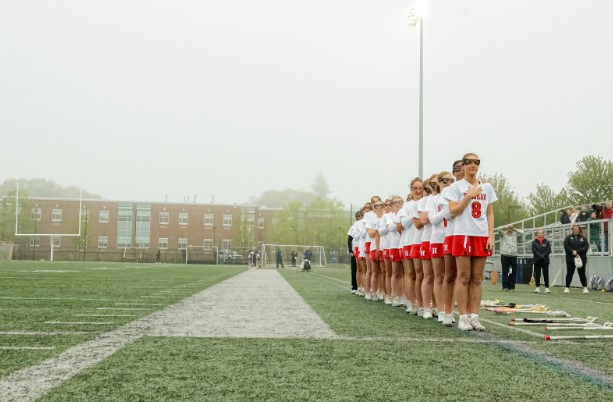 The Harborwomen stand together for the national anthem ahead of their intense matchup against Notre Dame Academy. (Taken by Hunter Gale)
