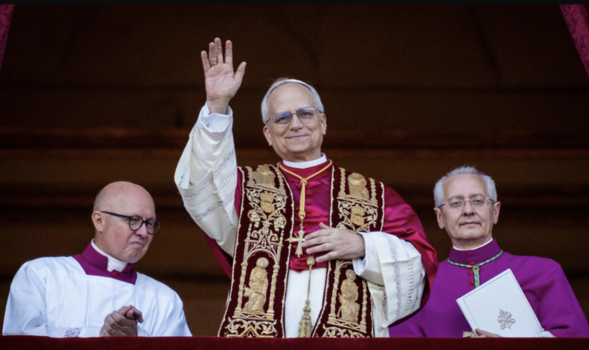 On the balcony of St. Peter’s Basilica, Pope Leo makes his first appearance as the pope.
