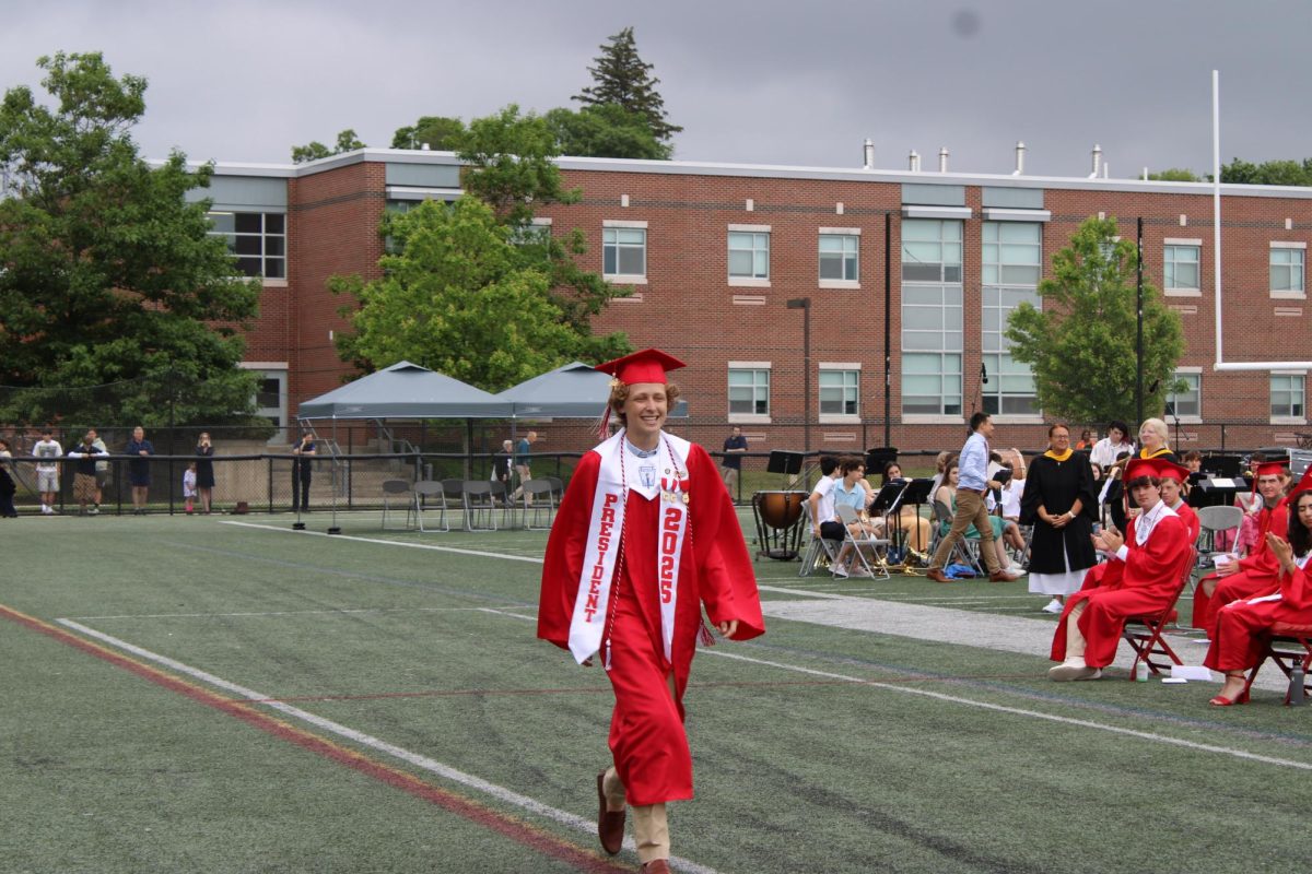 Class president Ryan Burns is the final student to receive his diploma. 