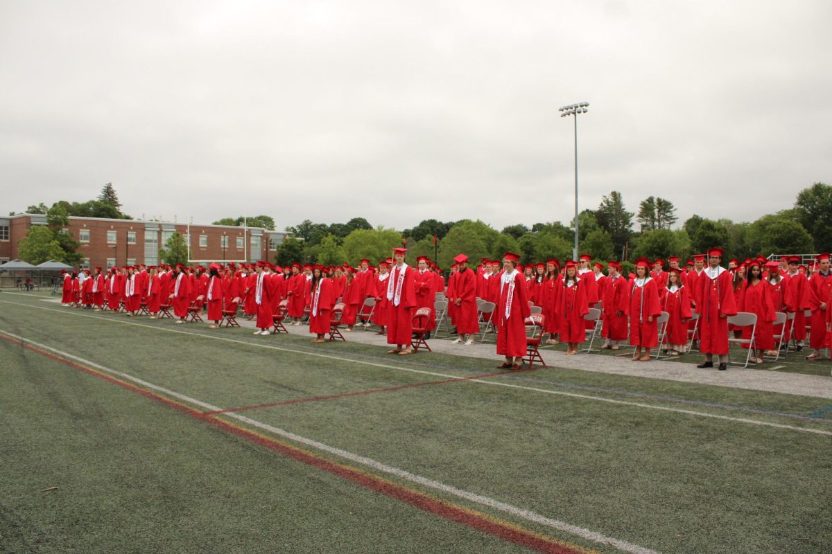 The Class of 2025 stands to face the crowd before doing the annual tassel toss. 