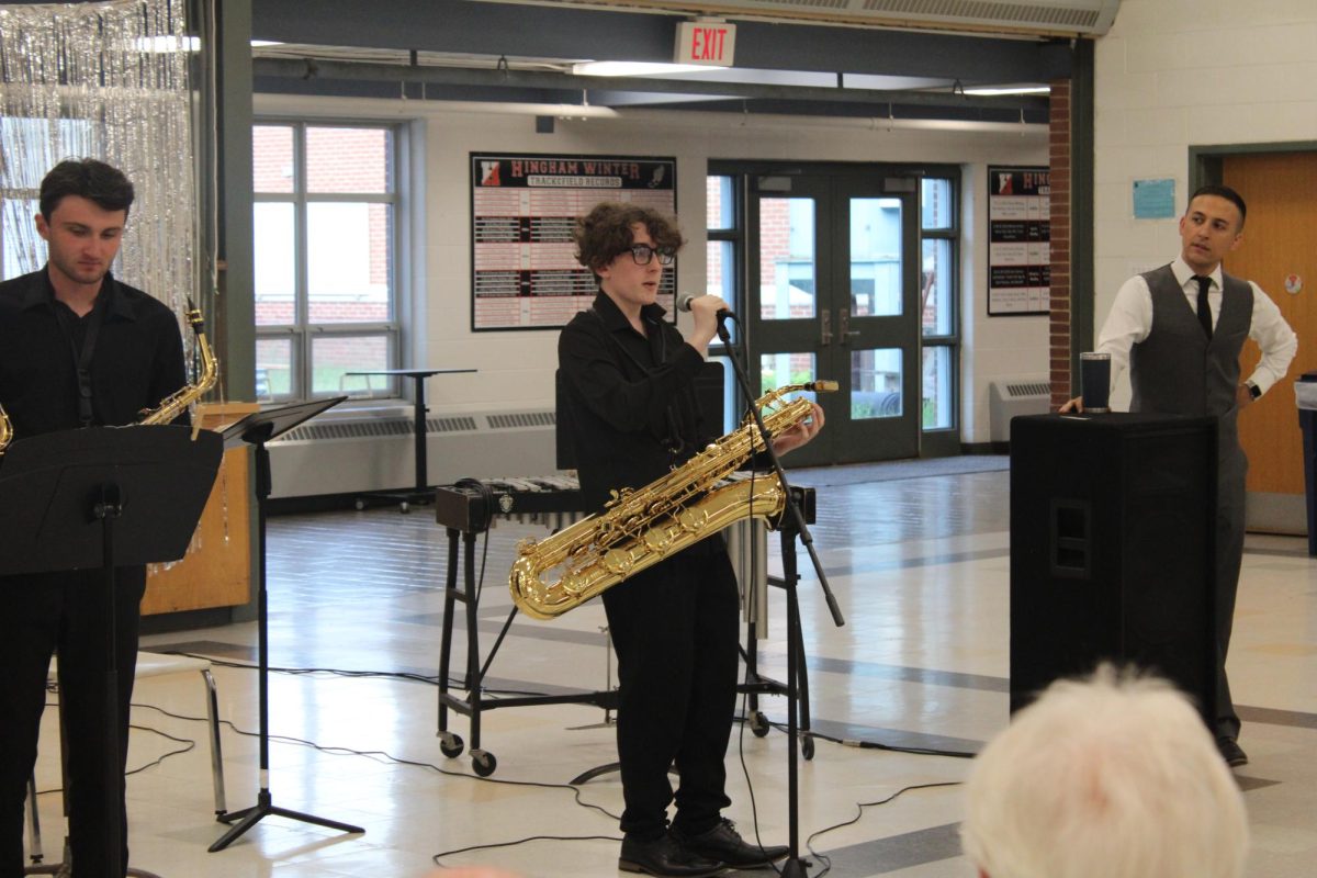 Anthony Ricci makes an announcement to a crowd.