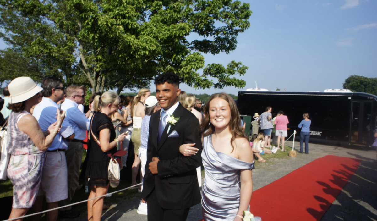 HHS seniors JD Lucas and Becca Kardoos walking the red carpet.