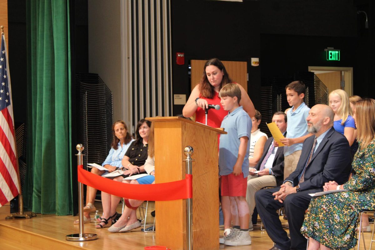 Foster School Teacher Leader Courtney  Stevenson introduced several of "Foster's Finest" students to speak about their favorite memories in Foster school. 