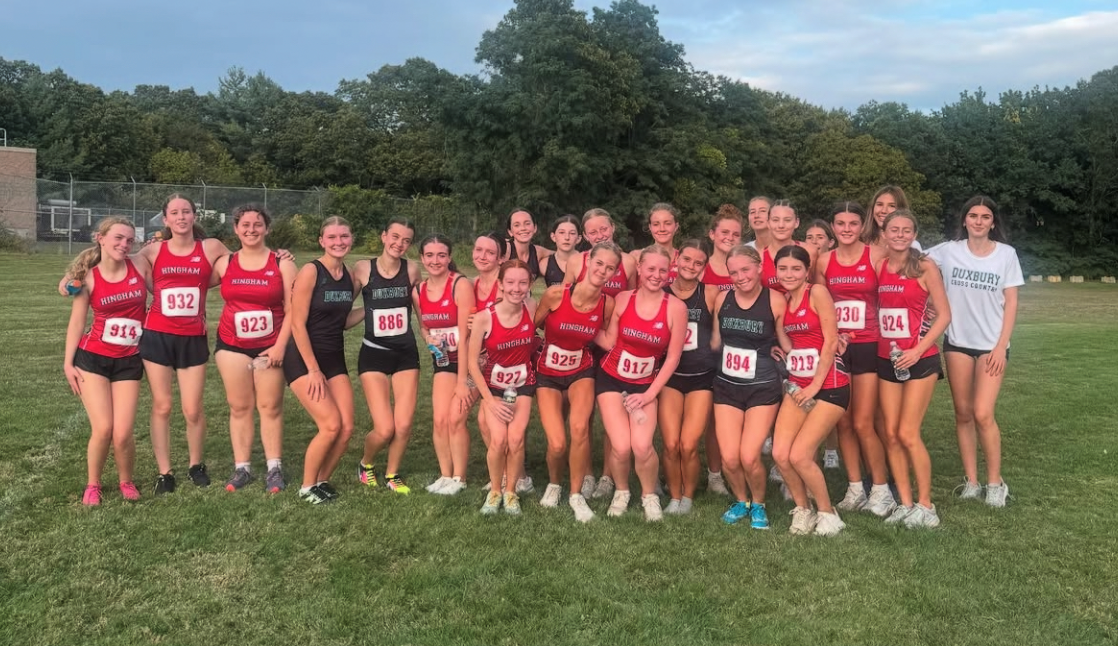 Hingham and Duxbury girls teams pose for a photo after their grueling race. 
