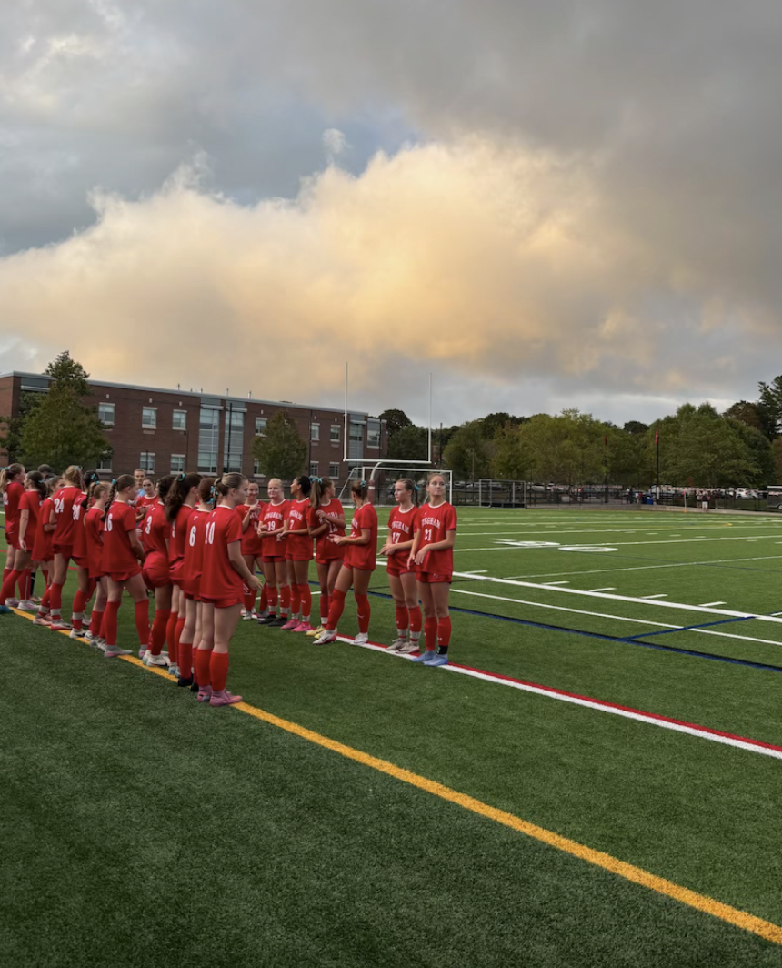 Hingham lines up for the announcement of the starting lineup before the game