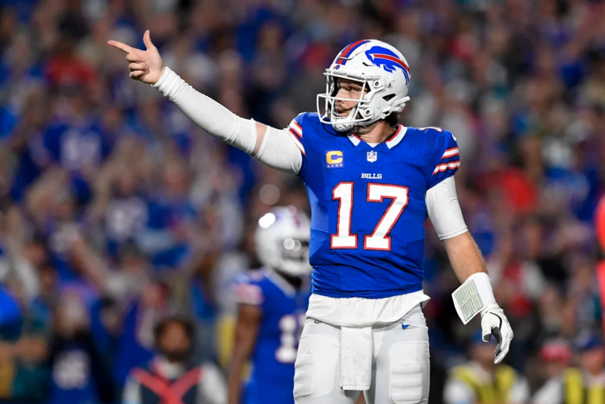 Buffalo Bills quarterback Josh Allen celebrates a first down  versus the Jacksonville Jaguars on September 23, 2024, in Orchard Park, NY. 