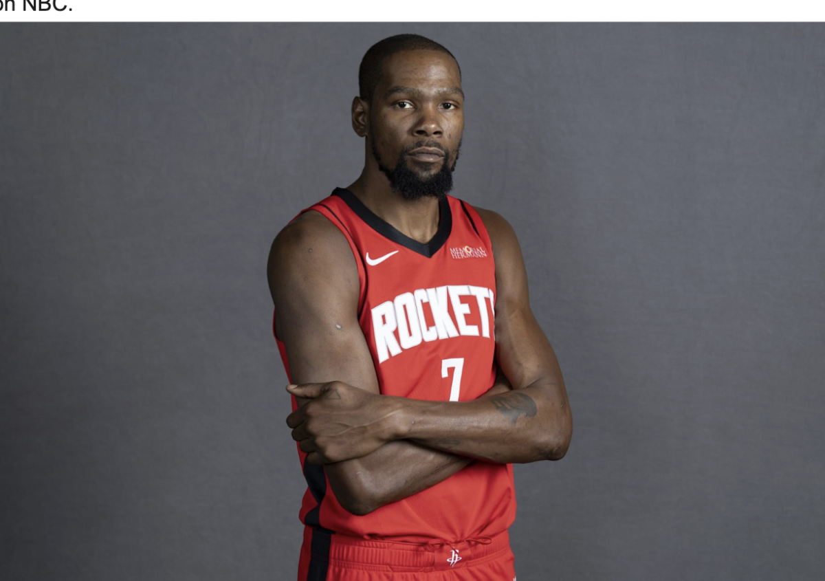 Kevin Durant posing in his new Rockets jersey. 
