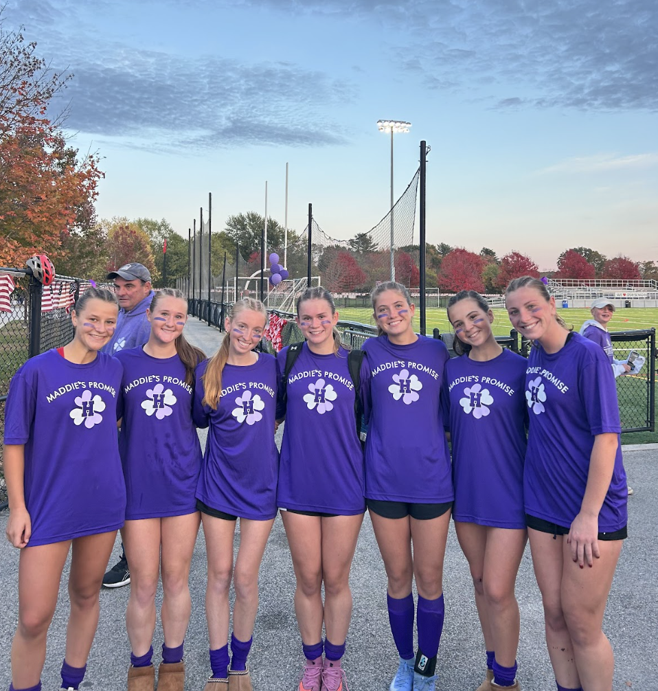 Players Sydney Bowyer, Hannah Mello, Tessa Grossman, Carolyn Downey, Lila Johnson, Kiki McGourty, and Hannah Lasch supporting Maddie’s Promise after their win against Milton.