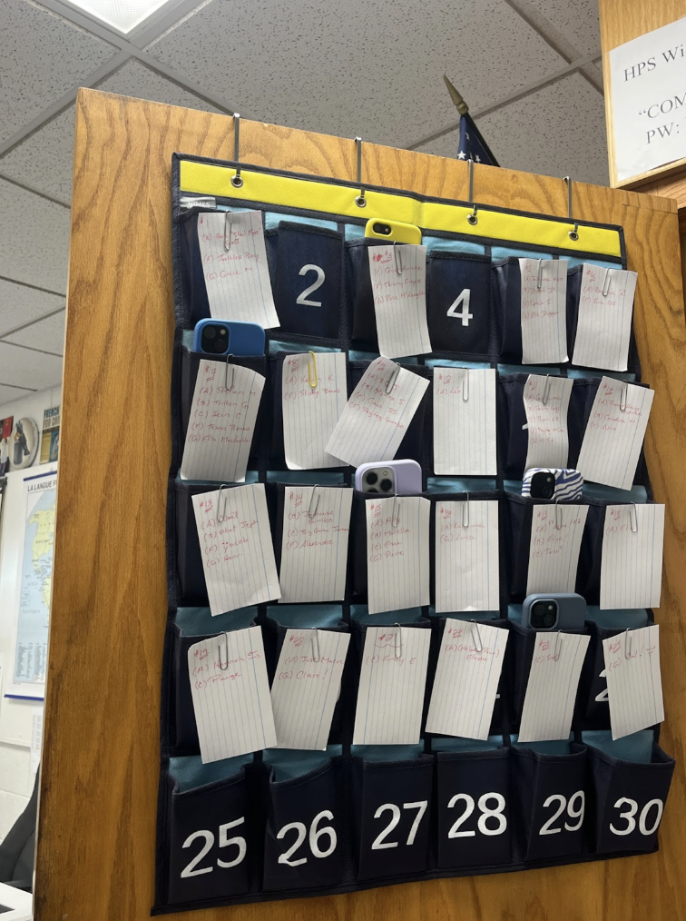 Hingham teachers use numbered “phone jails” to collect phones before class begins.