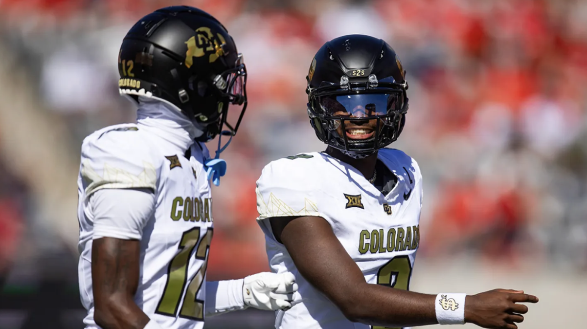 Travis Hunter (left) and Shedeur Sanders (right) express their joy after making a big play against the Arizona Wildcats.