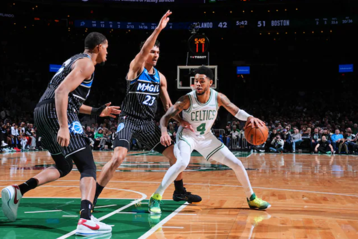 Anfernee Simons #4 of the Boston Celtics drives to the basket against the Orlando Magic at TD Garden in Boston on November 23, 2025.