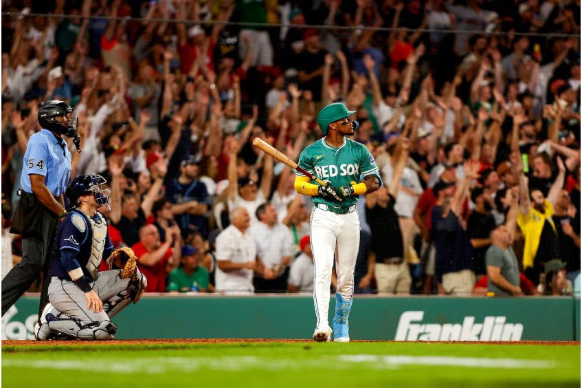 Ceddanne Rafaela watches his Home Run sail over the Green Monster as the Red Sox walk off the Rays 4-3 on July 11, 2025.