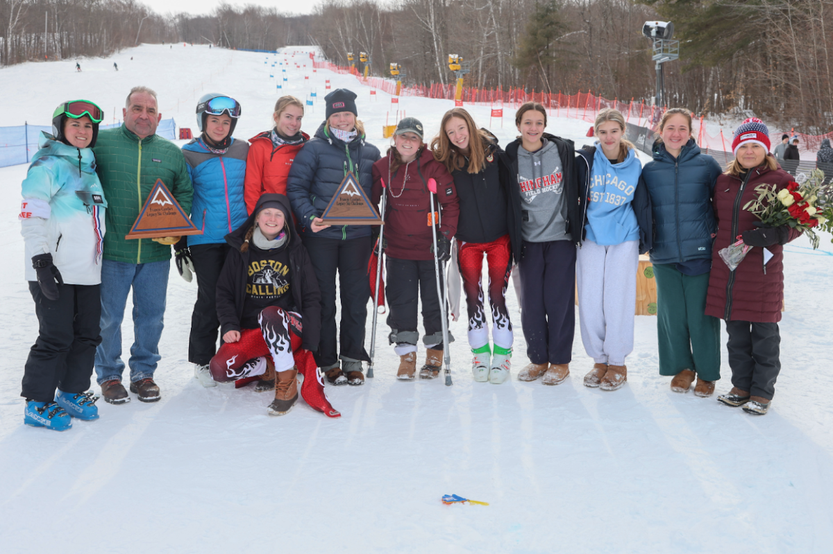 Hingham High Girls Ski Team poses after the race which they dedicated to former Hingham skier Francis Cundari.