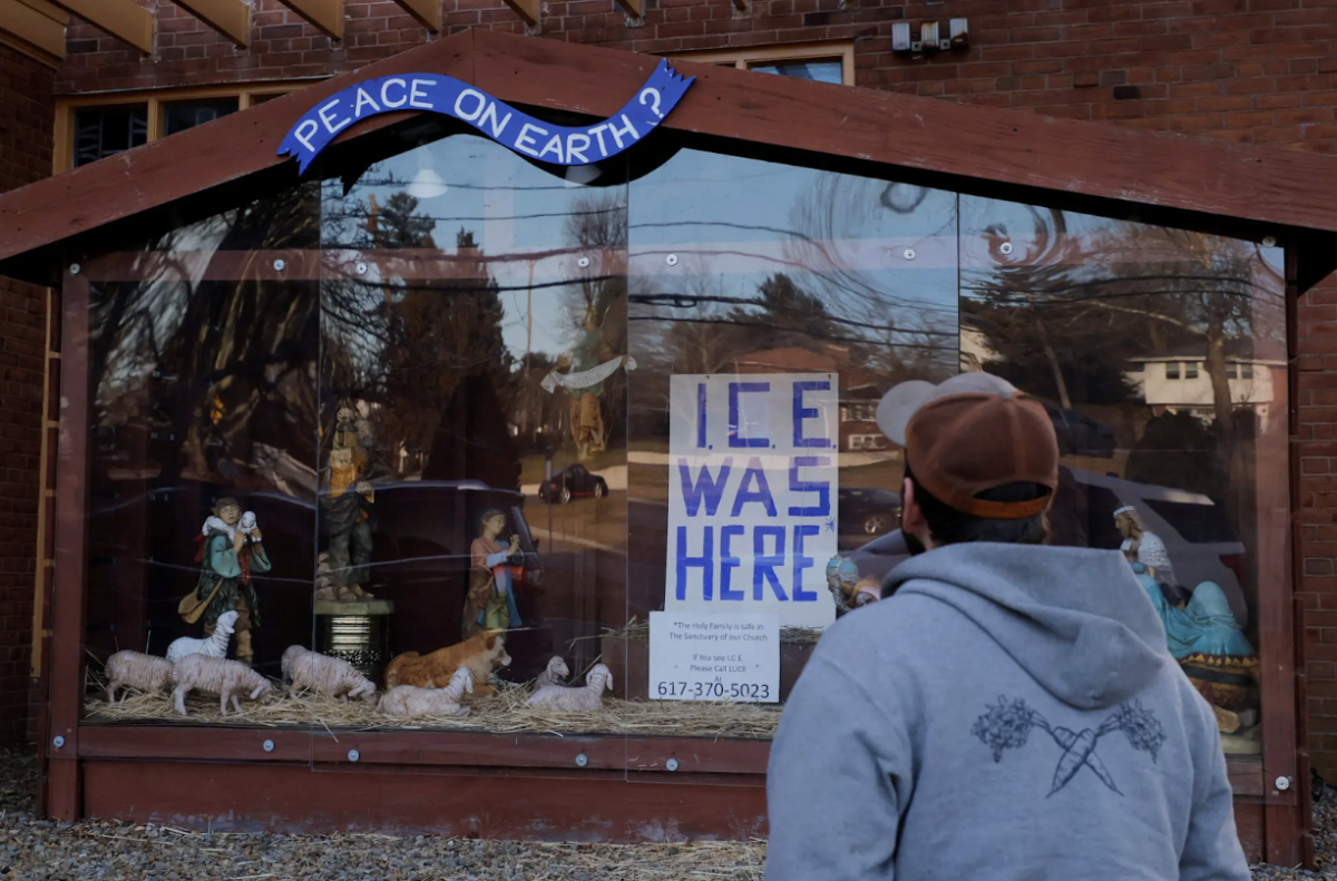 St. Susanna’s Catholic Church in Dedham, MA, displays an “ICE was here” sign with its incomplete Nativity scene.