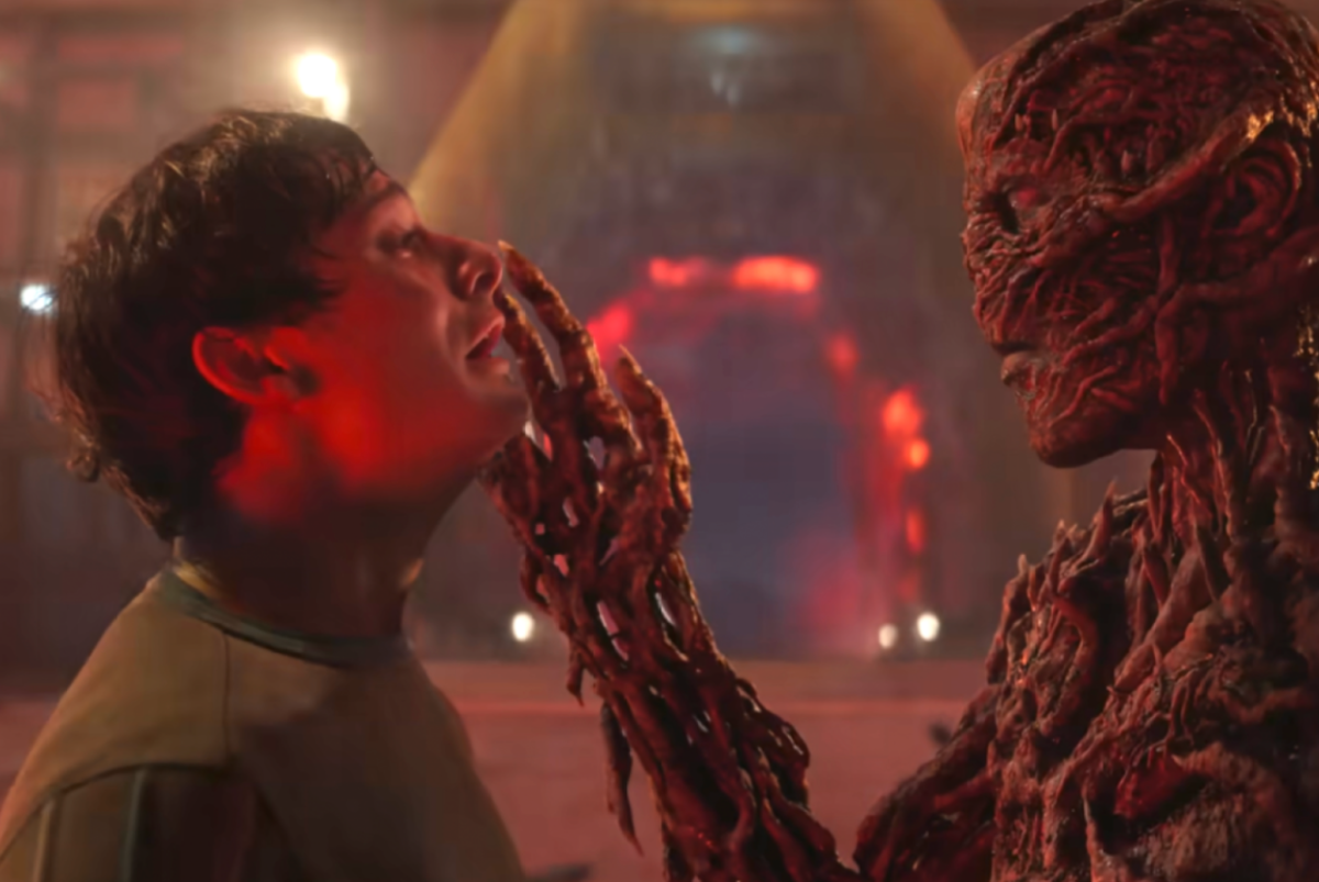 Vecna psychically holds Wii Byers in the air.