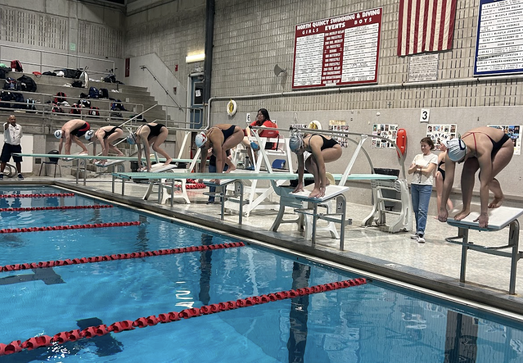 Skippermen seniors Johnny Appleton, Lila Johnson, Ella Cignetti, and Emma Izmirlic preparing for their final race together.