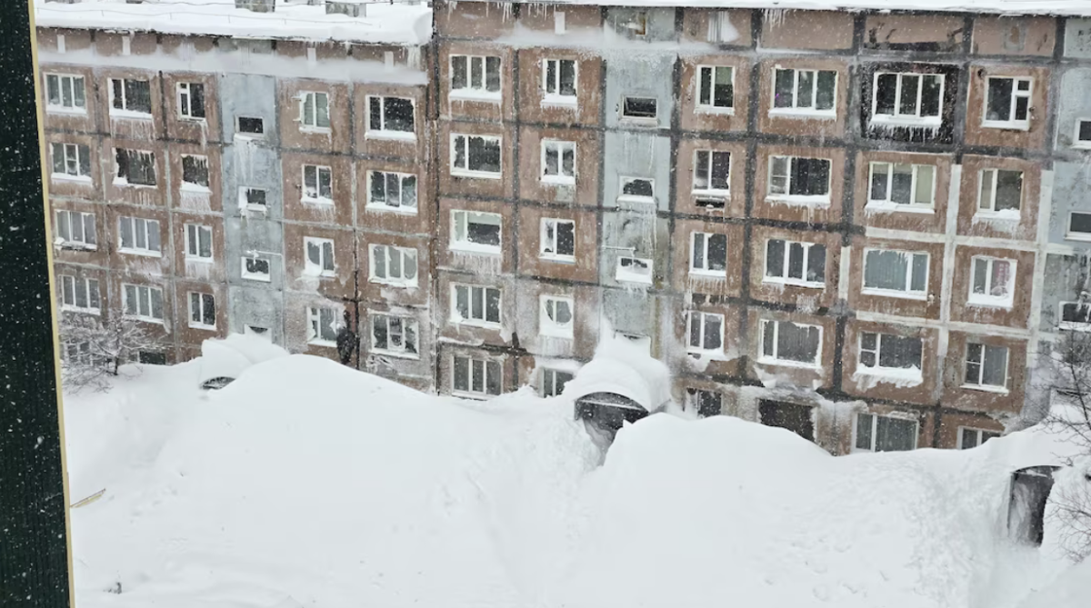 The snow piles high in the town of Petropavlovsk‑Kamchatskiy, Russia.