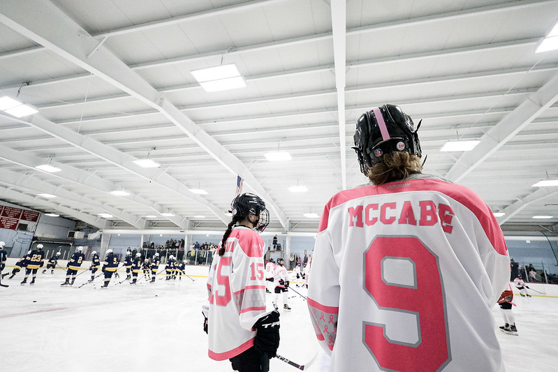 Sophomore Sam McCabe standing in warmups ahead of the Girls Hockey game vs Notre Dame Academy.