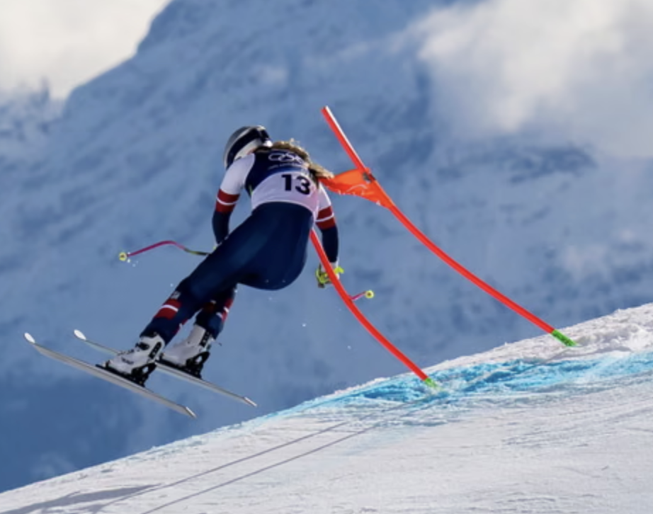 Lindsey Vonn hooks a gate during the Olympics downhill race.