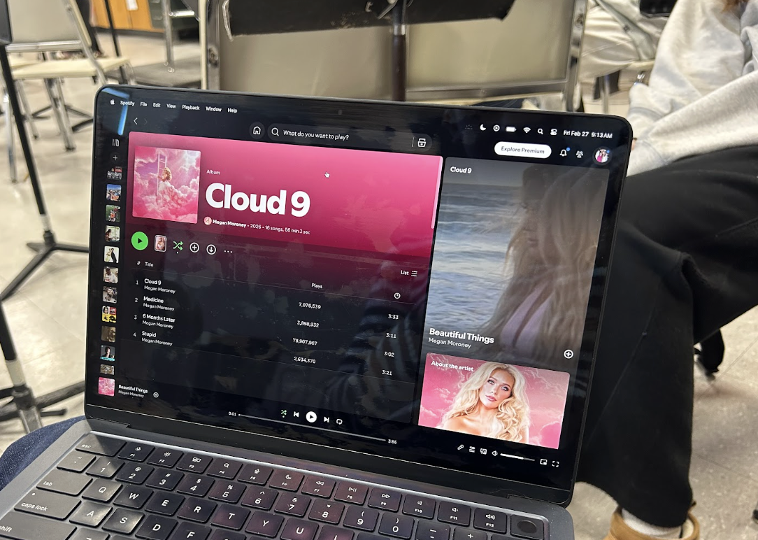 Students listen to Megan Moroney's new album, “Cloud 9” in study.  