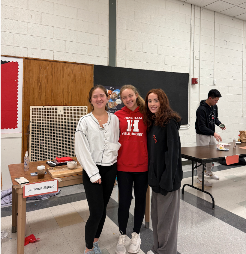 (left to right) Emily Kiernan, Arianna Sood, and Abby Mercer participate at the Dumplingfest.