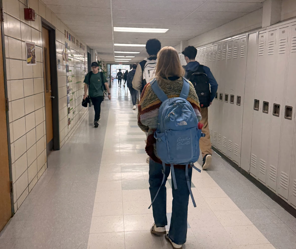Students walk the halls in between blocks at Hingham High School,